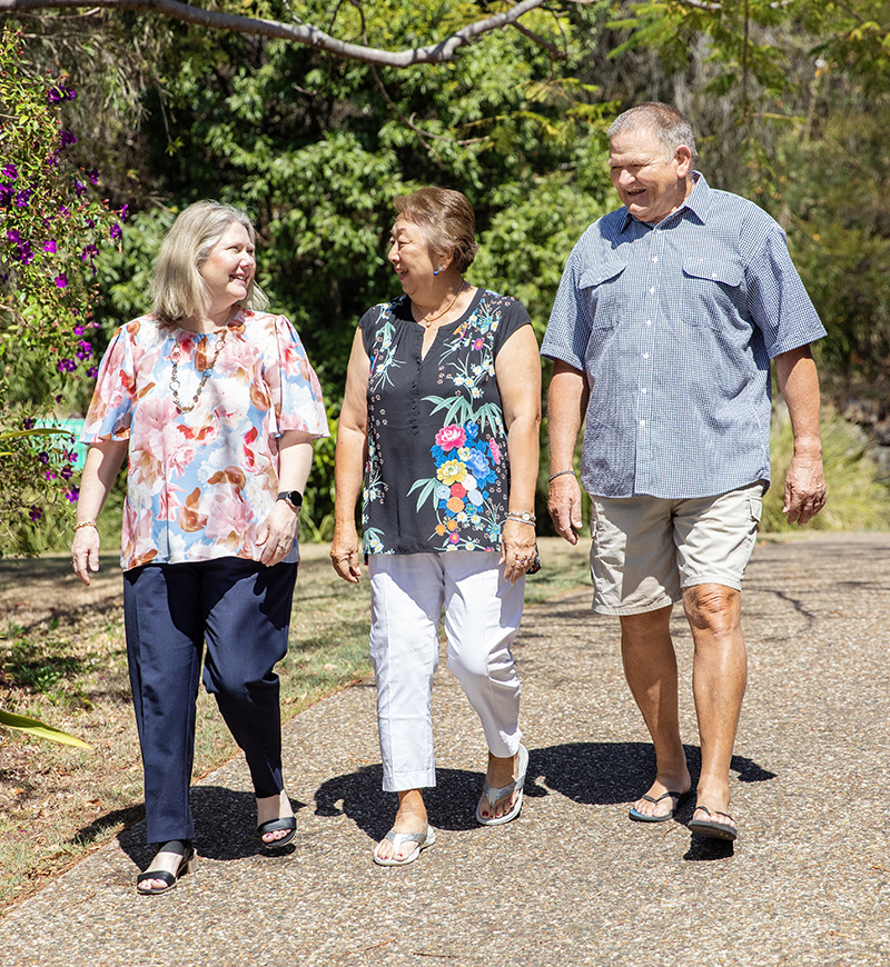 Photo of Aspire4Life assessor walking with clients