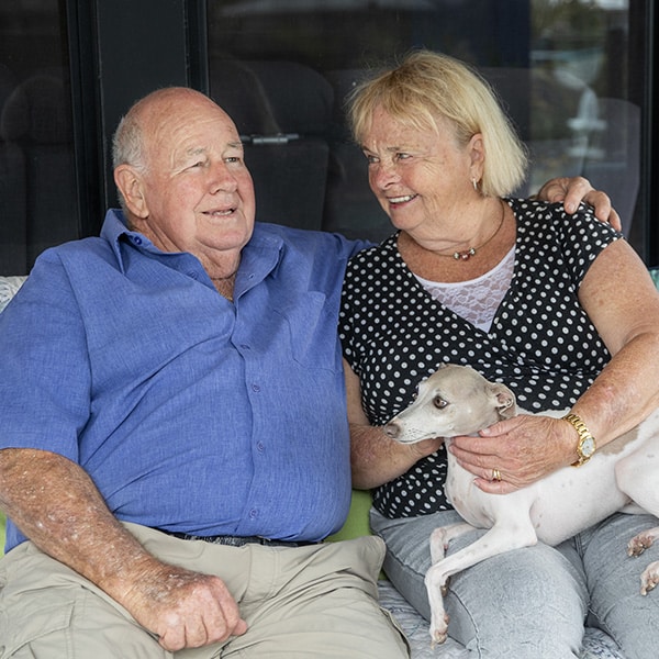 Clients with their pet dog Photo of clients with their pet dog